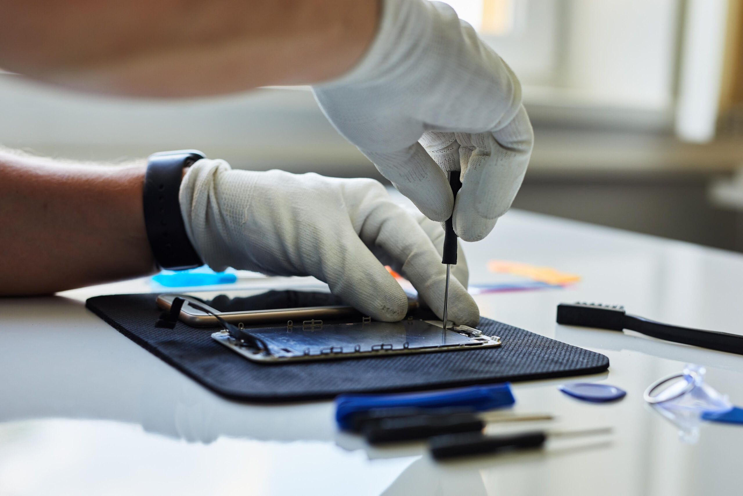 phone repair.Technician repair mobile phone in electronic smart